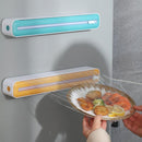 Dispensador plástico do envoltório para o filme aderente.